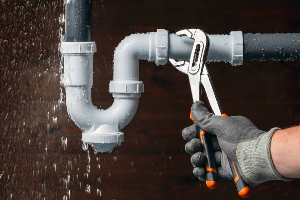 Professional Emergency Plumber technician working in Lake in the Hills, IL